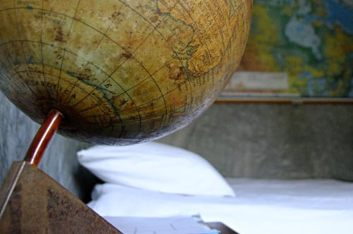 A globe and bed in the Map Room